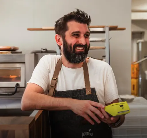 Card payment at a bakery counter